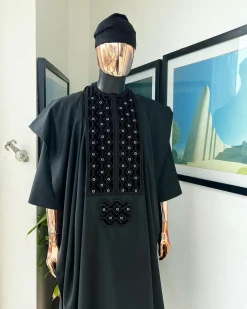 A charcoal black, grommet eyelet on dropping octa embroidery details agbada