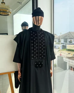 A charcoal black, grommet eyelet on dropping octa embroidery details agbada