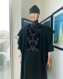 A charcoal black, grommet eyelet on root splash embroidery details agbada