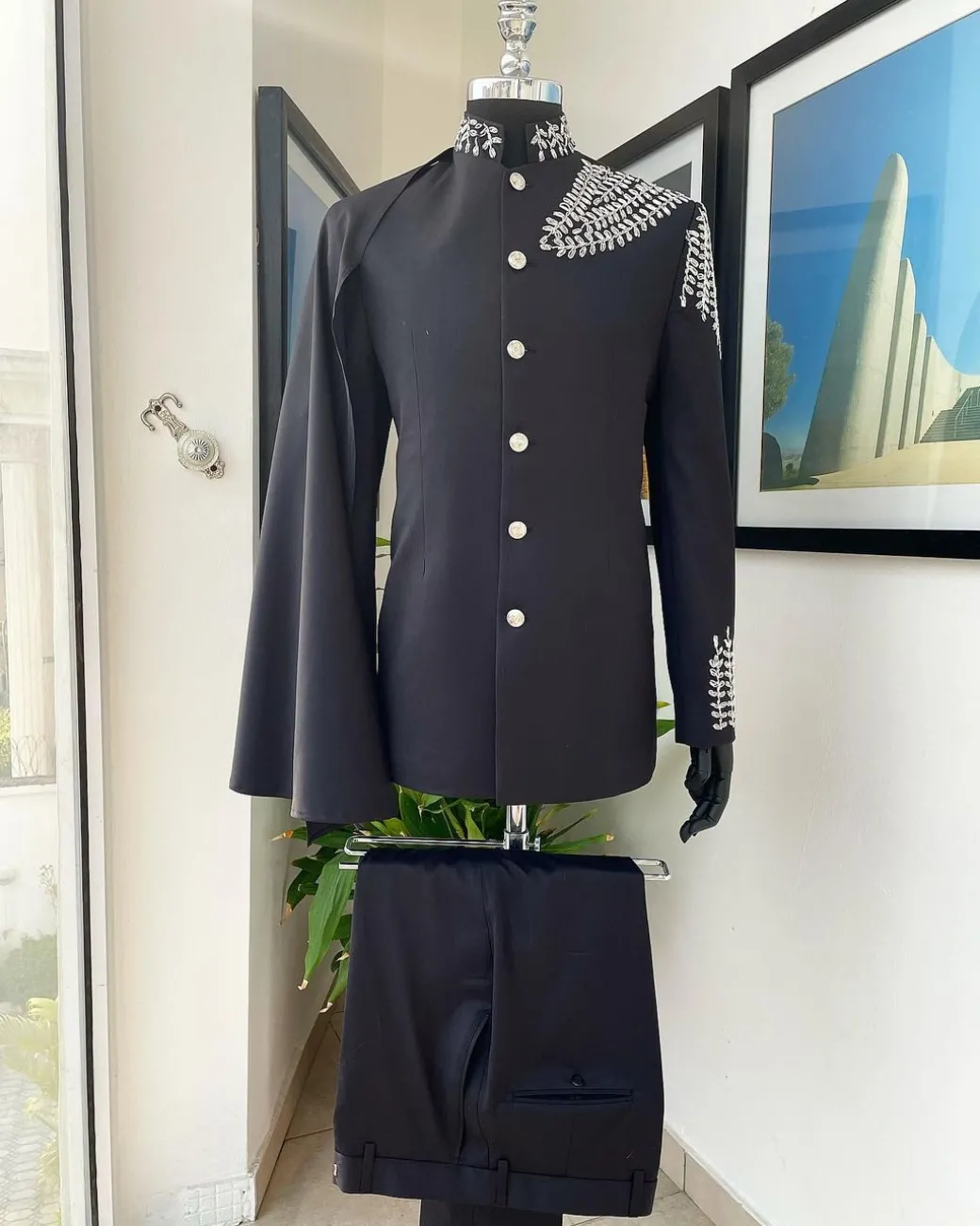 A Charcoal black, hand “Ide” silver metal wire embrodery, right-hand sache safari suit