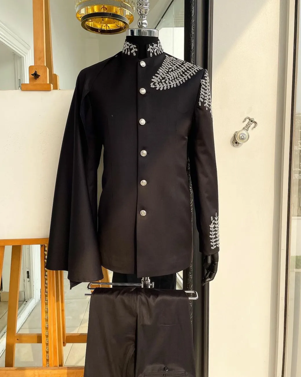 A Charcoal black, hand “Ide” silver metal wire embrodery, right-hand sache safari suit
