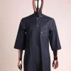 A charcoal black, inverted and closed flap shaped pocket details, 3/4 sleeve African senator kaftan native.