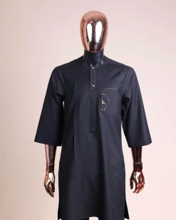 A charcoal black, inverted and closed flap shaped pocket details, 3/4 sleeve African senator kaftan native.
