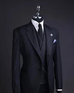 A Charcoal black, knitted, notch lapel suit