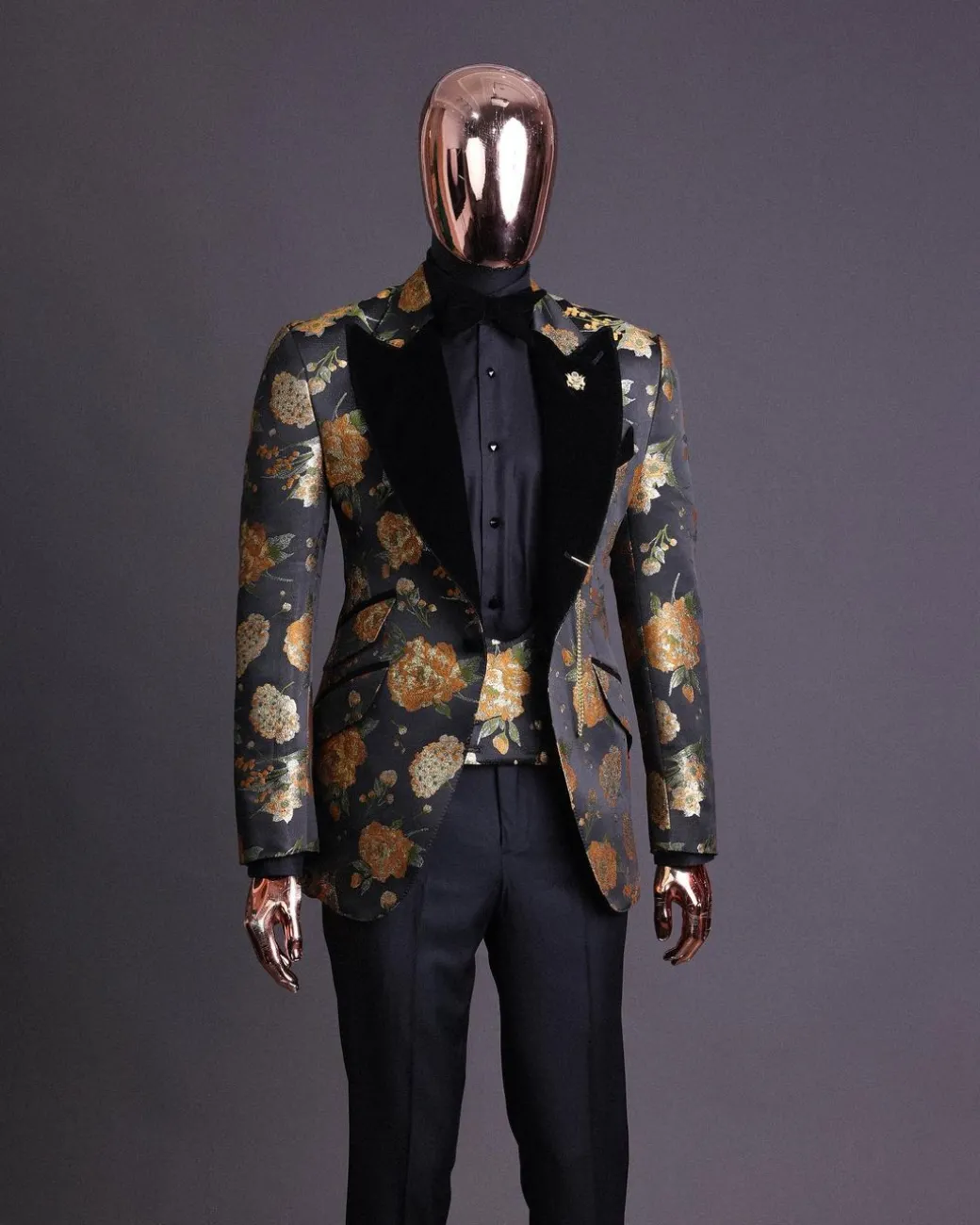 A Charcoal Black, Lemon Green, Orange Mix Metallic Floral Jacquard, Peak Lapel Tuxedo Suit.