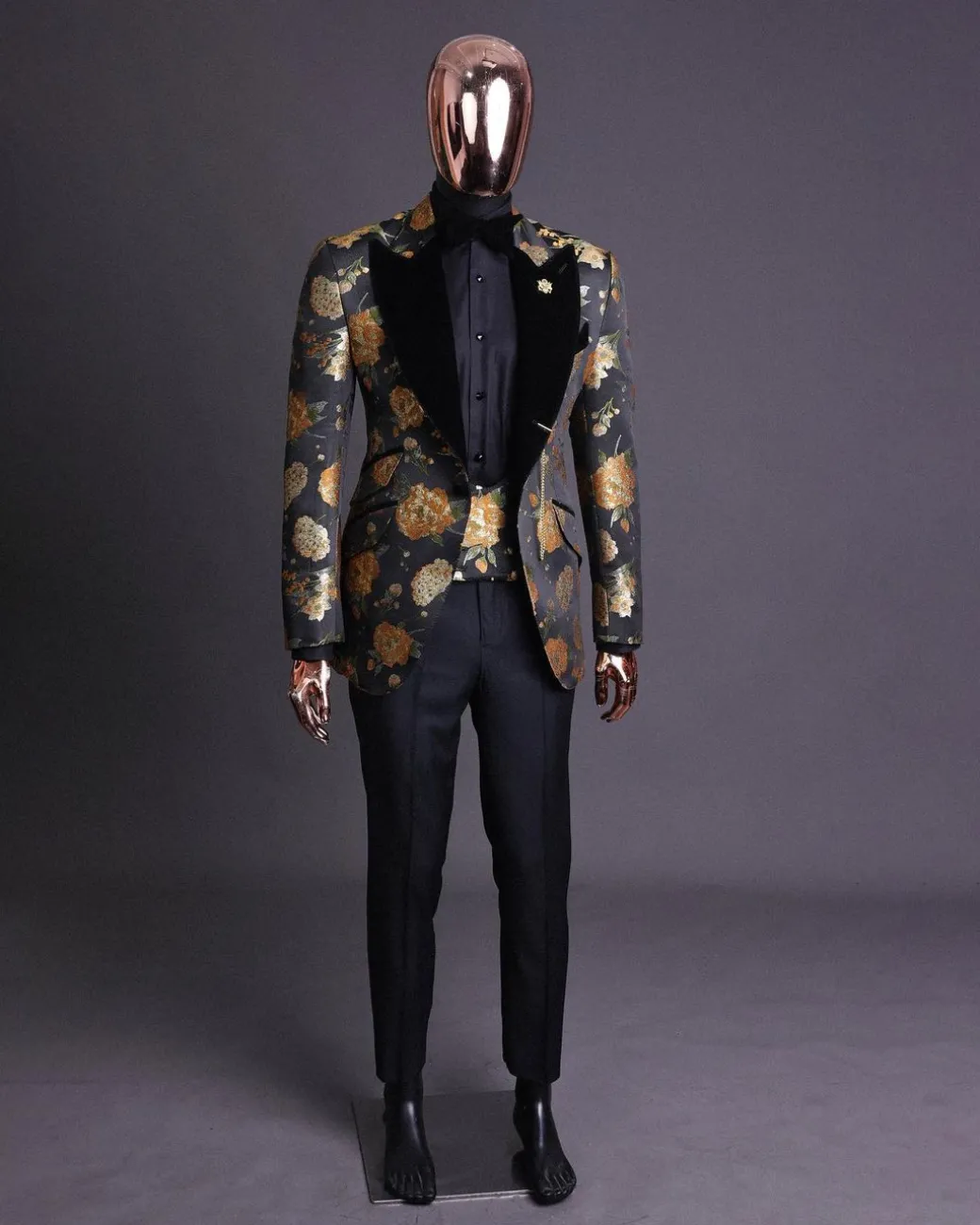 A Charcoal Black, Lemon Green, Orange Mix Metallic Floral Jacquard, Peak Lapel Tuxedo Suit.