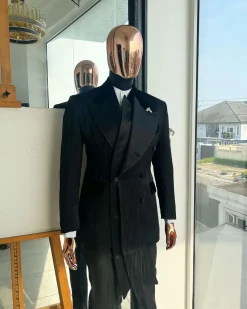 A Charcoal Black “Mandate” rain drop patterned jacquard, triple breasted, 2 layer dropping sache tuxedo suit.