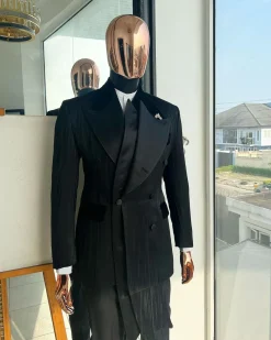 A Charcoal Black “Mandate” rain drop patterned jacquard, triple breasted, 2 layer dropping sache tuxedo suit.