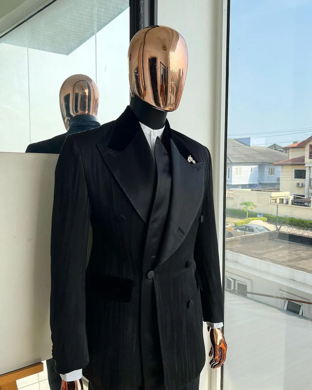 A Charcoal Black “Mandate” rain drop patterned jacquard, triple breasted, dropping sache tuxedo suit