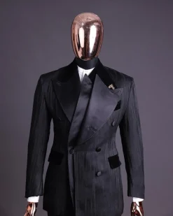 A Charcoal Black “Mandate” rain drop patterned jacquard, triple breasted, dropping sache tuxedo suit