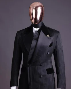 A Charcoal Black “Mandate” rain drop patterned jacquard, triple breasted, dropping sache tuxedo suit