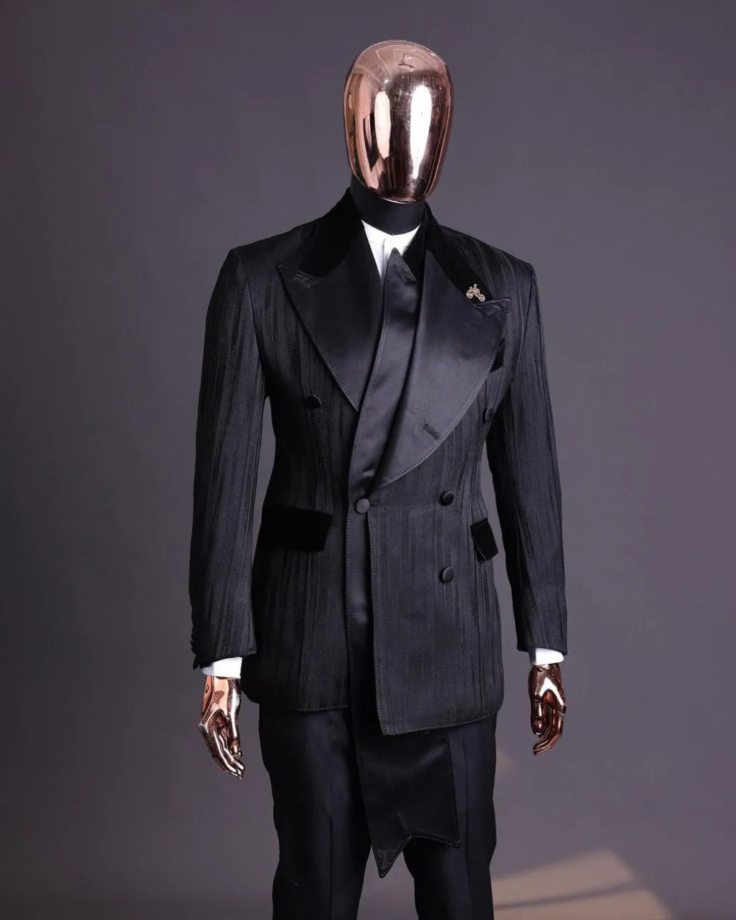 A Charcoal Black “Mandate” rain drop patterned jacquard, triple breasted, dropping sache tuxedo suit