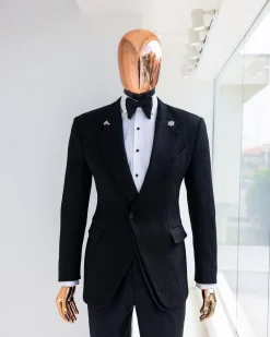 A Charcoal black, mushroom pattern jacquard, notch lapel tuxedo suit.