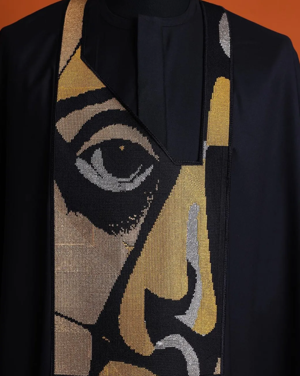 A Charcoal black, “Oju Aye” on canvas gold and black mix embroidery details Agbada