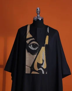 A Charcoal black, “Oju Aye” on canvas gold and black mix embroidery details Agbada