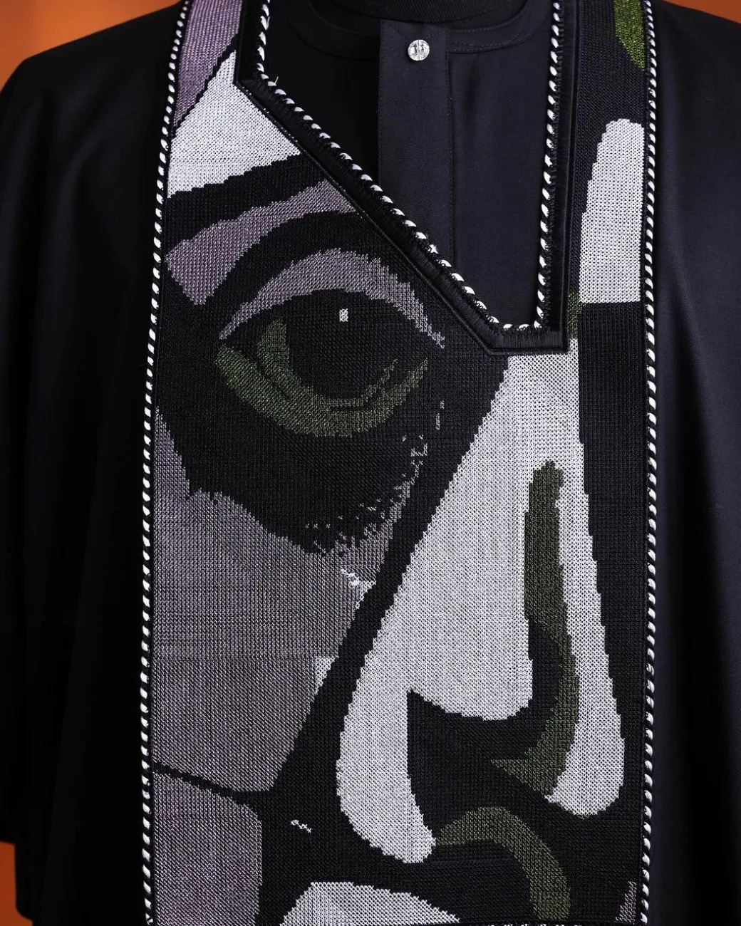 A Charcoal black, “Oju Aye” on canvas embroidery details agbada, silver clear view Swarovski buttons on 3/4 sleeve kaftan & sokoto