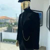 A charcoal black peak lapel-soaked Italian velvet tuxedo suit
