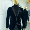 A charcoal black peak lapel soaked Italian velvet tuxedo suit