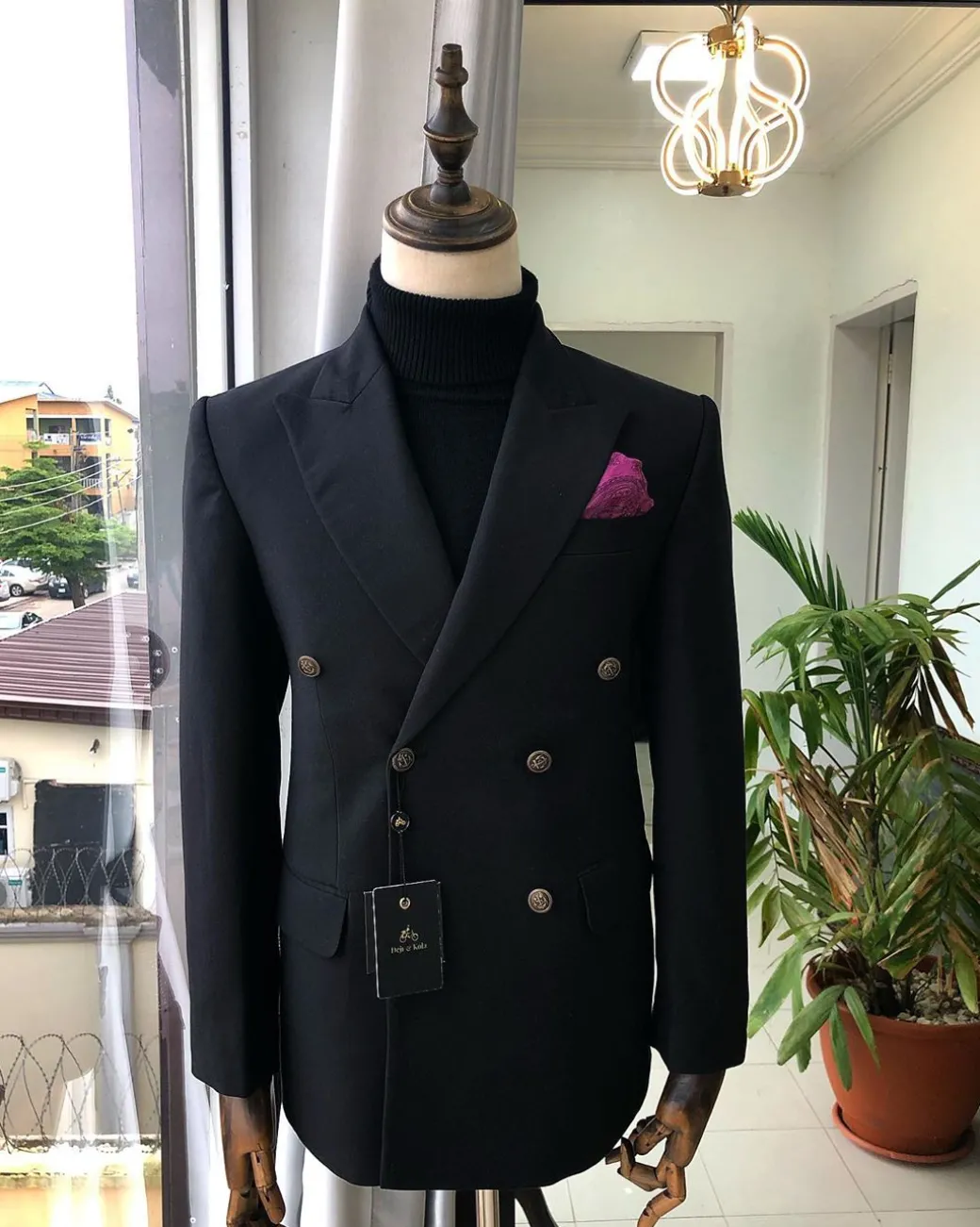 A Charcoal Black Peak Lapel double breasted Suit
