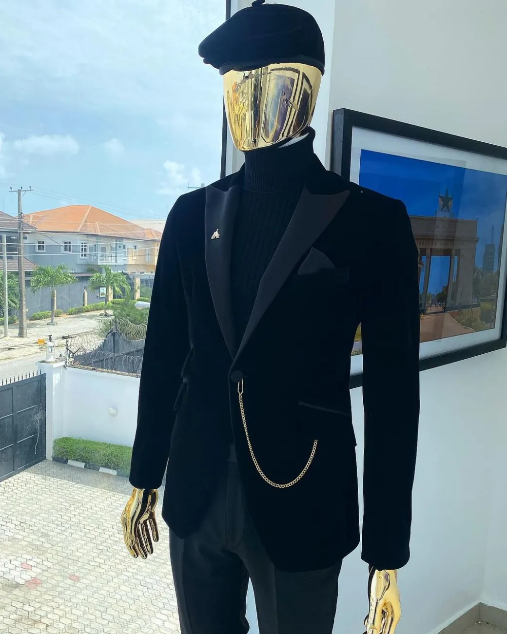 A charcoal black peak lapel-soaked Italian velvet tuxedo suit