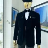 A charcoal black “peaky blinders” soaked Italian velvet shawl lapel tuxedo suit