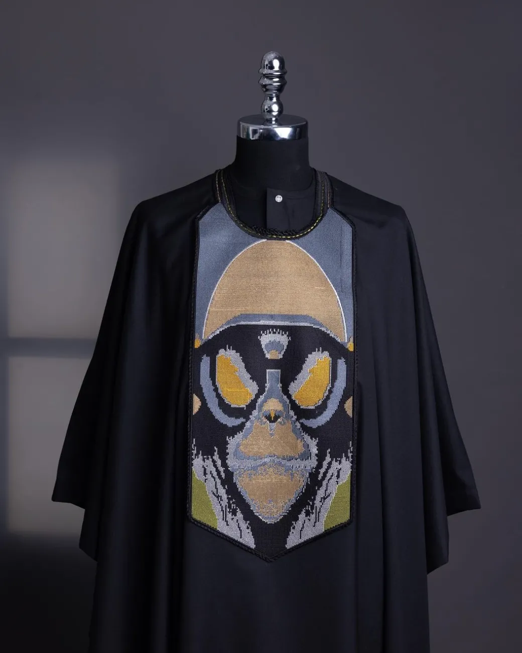 A charcoal black, “Planet Of Apes” embroidery Agbada