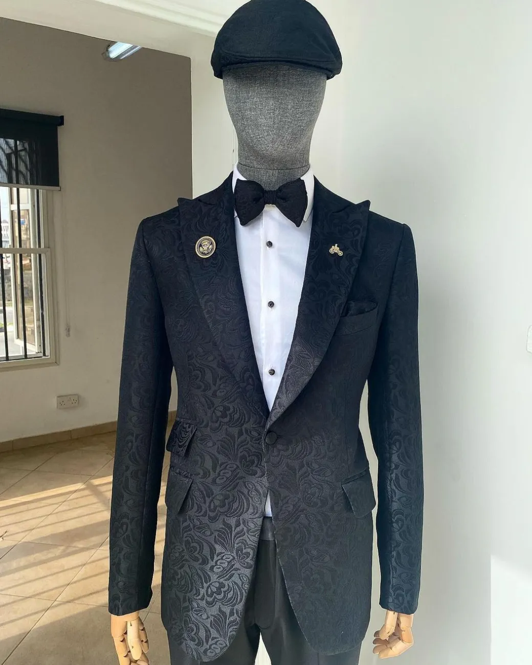 A Charcoal Black reloaded “peaky blinders” floral jacquard peak lapel suit.