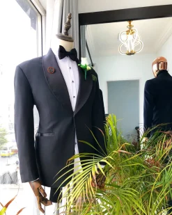 A Charcoal Black Shawl Lapel Tuxedo Suit.