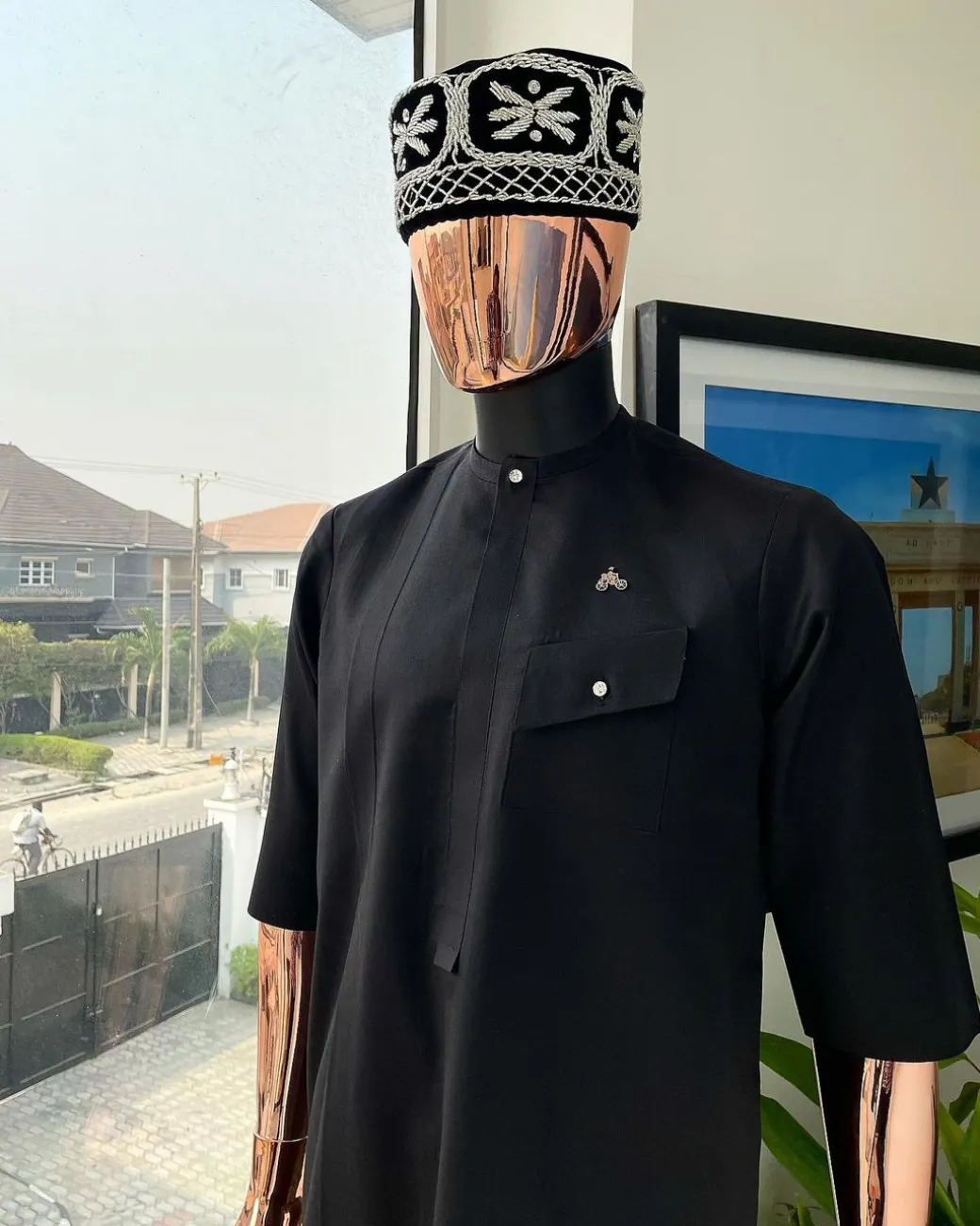A Charcoal black, slanting combat pocket, front flap with clear view swarovski button detailing african traditional senator kaftan native.