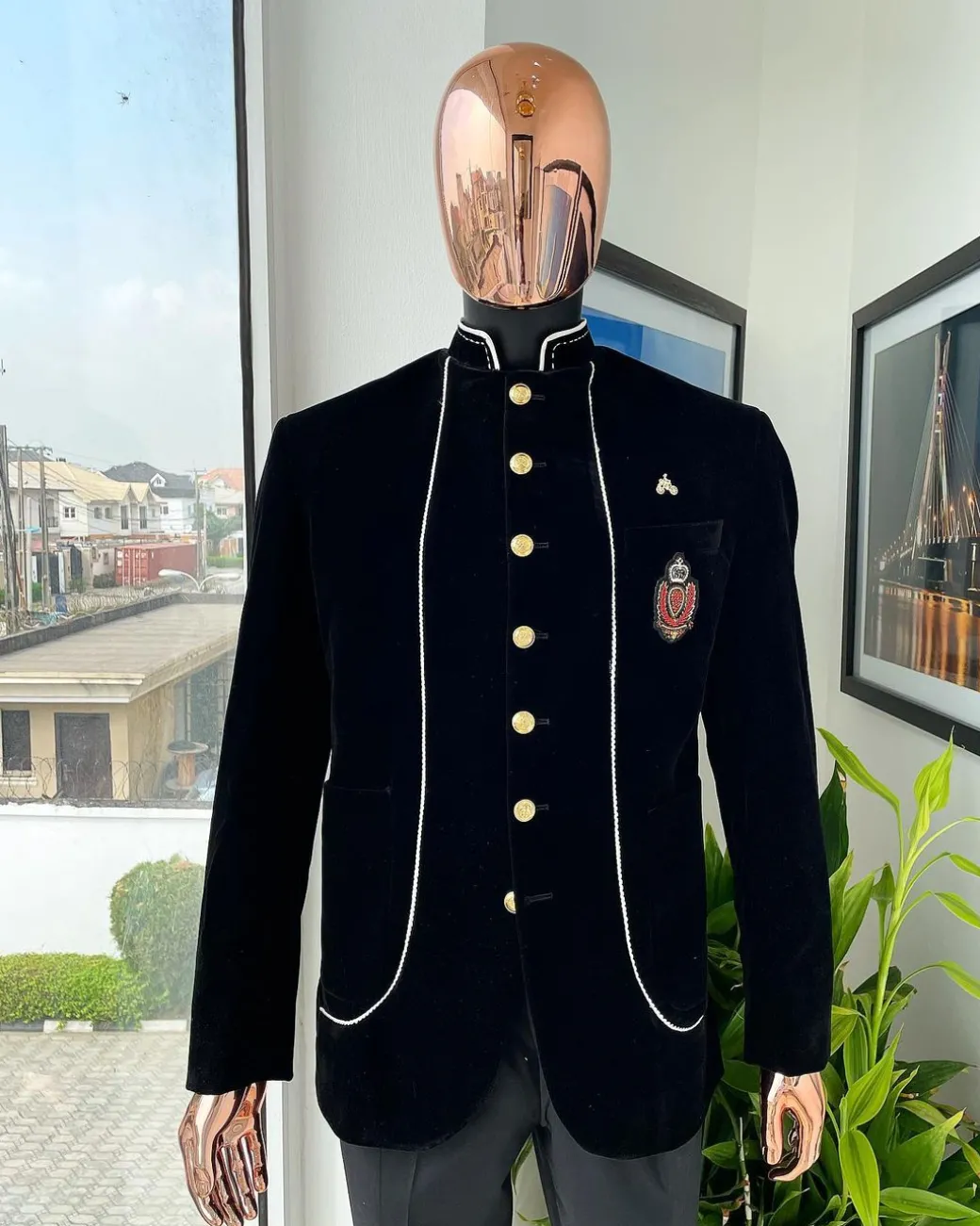 A charcoal black Soaked Italian velvet, long sleeve with woven white tread taping safari suit