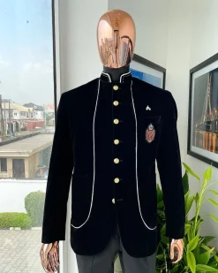 A charcoal black Soaked Italian velvet, long sleeve with woven white tread taping safari suit