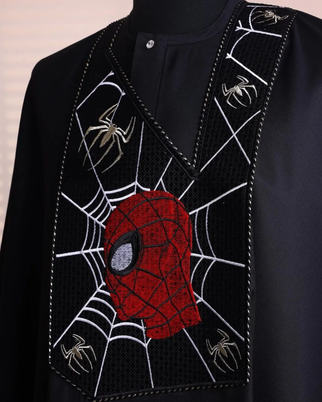 A charcoal black, “Spider-Man” embroidery details agbada, 3/4 sleeve kaftan & sokoto