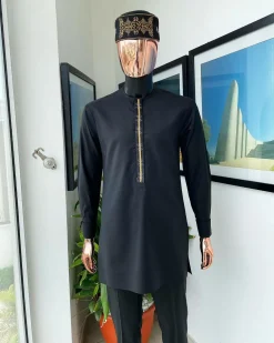 A charcoal black, starkled connected rectangle embroidery detailing African traditional kaftan, fila and Sokoto