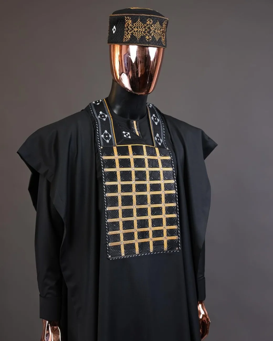 A charcoal black startled connected rectangle, with ss30 light topaz Swarovski crystal detailing agbada