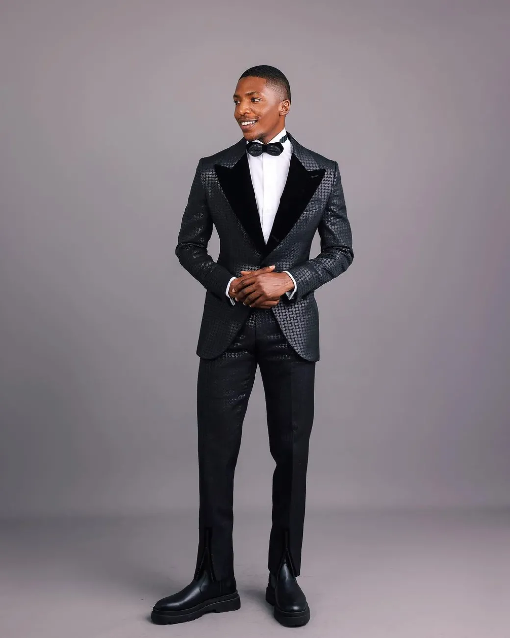 A Charcoal Black, Stuffed Or Slanted Square-Patterned Jacquard Peak lapel Tuxedo Suit