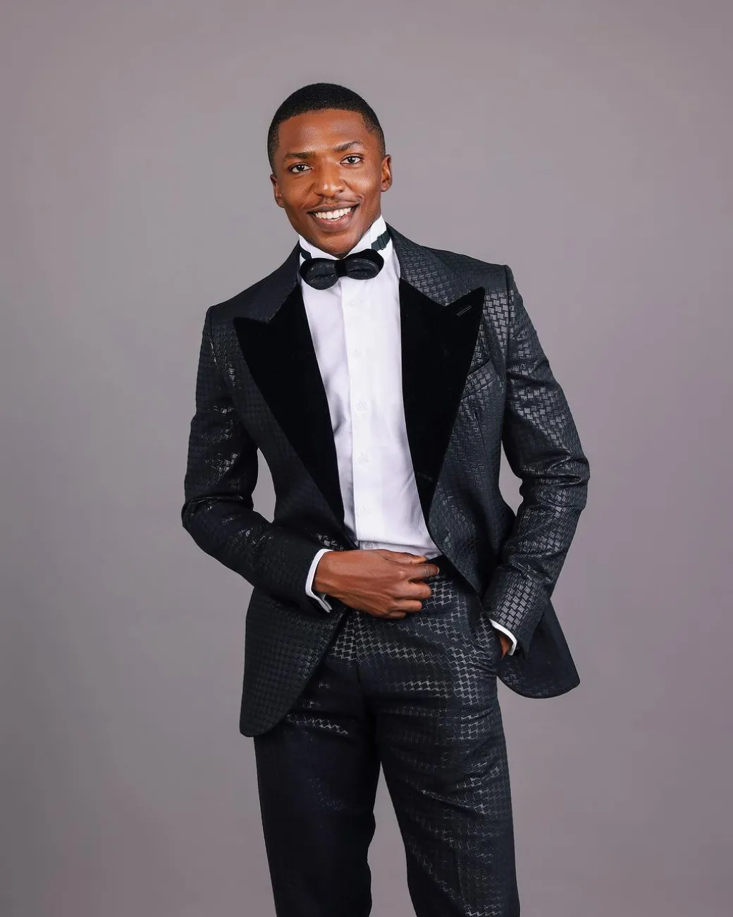 A Charcoal Black, Stuffed Or Slanted Square-Patterned Jacquard Peak lapel Tuxedo Suit