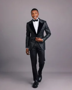 A Charcoal Black, Stuffed Or Slanted Square-Patterned Jacquard Peak lapel Tuxedo Suit