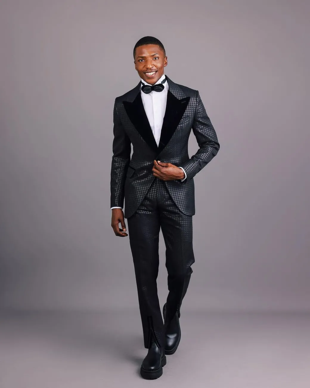 A Charcoal Black, Stuffed Or Slanted Square-Patterned Jacquard Peak lapel Tuxedo Suit