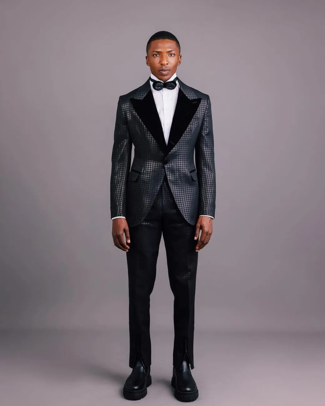 A Charcoal Black, Stuffed Or Slanted Square-Patterned Jacquard Peak lapel Tuxedo Suit