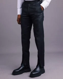A Charcoal Black, Stuffed/Slanted Square-Patterned Jacquard pant with zip-line detailing