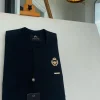 A charcoal black, Tiny Flap with Gold Queen bee crown details African traditional senator kaftan native.