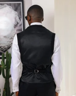 A Charcoal Black U-Cut waist coat with layered back cut.