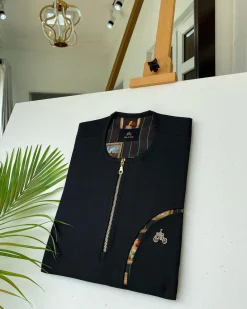 A Charcoal Black with a gold zip opening, a cross-display functional pocket Kaftan