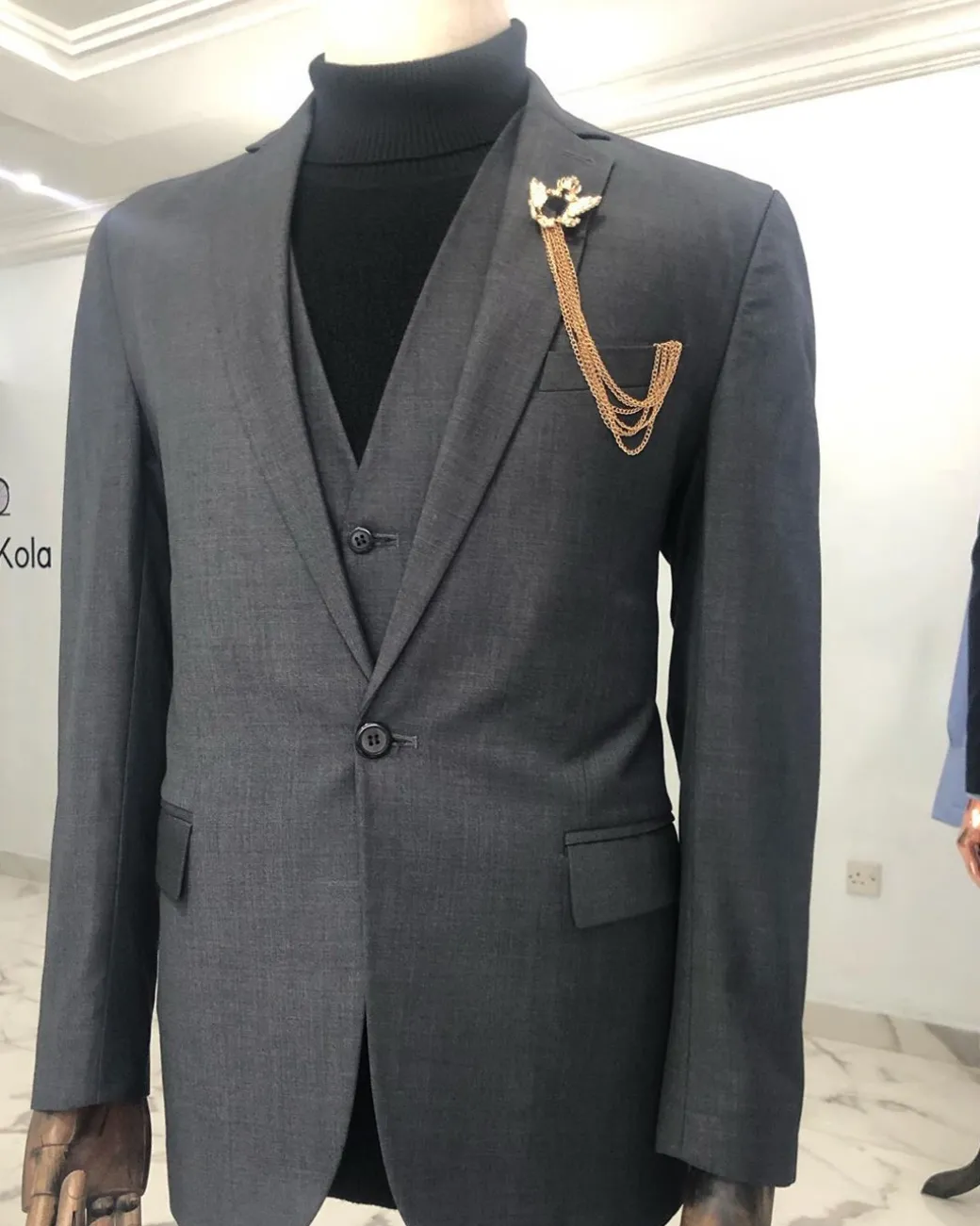 A Charcoal Grey notch lapel Corporate Suit
