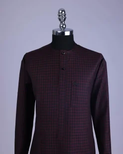 A Checkered black and burgundy with black Swarovski button detailing kaftan and sokoto