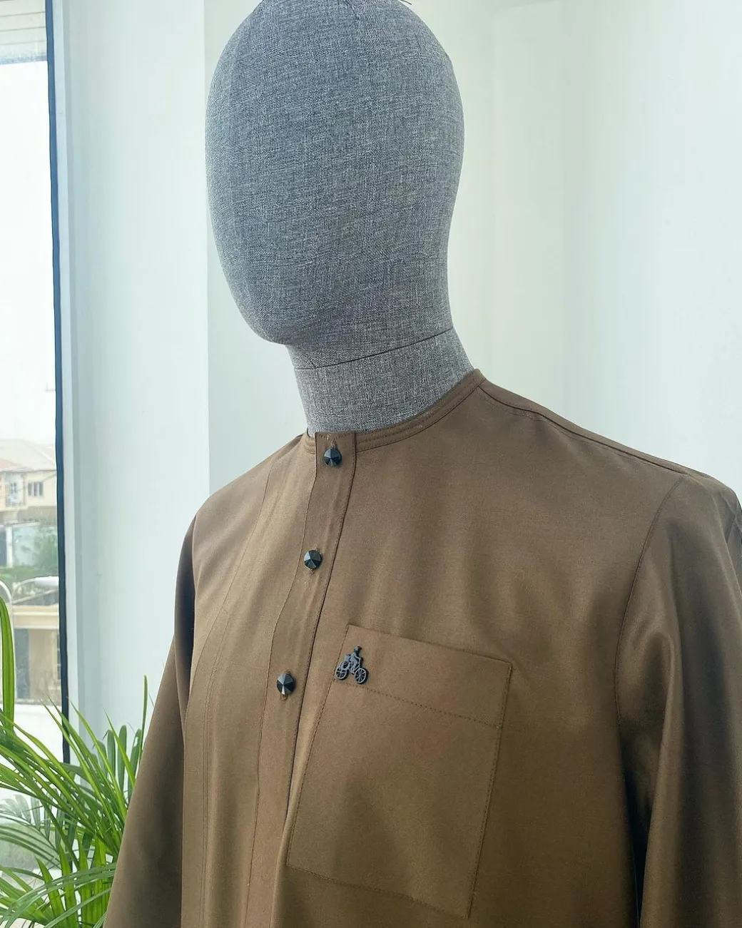 A Chocolate Brown 3/4 sleeve with patch pocket African kaftan