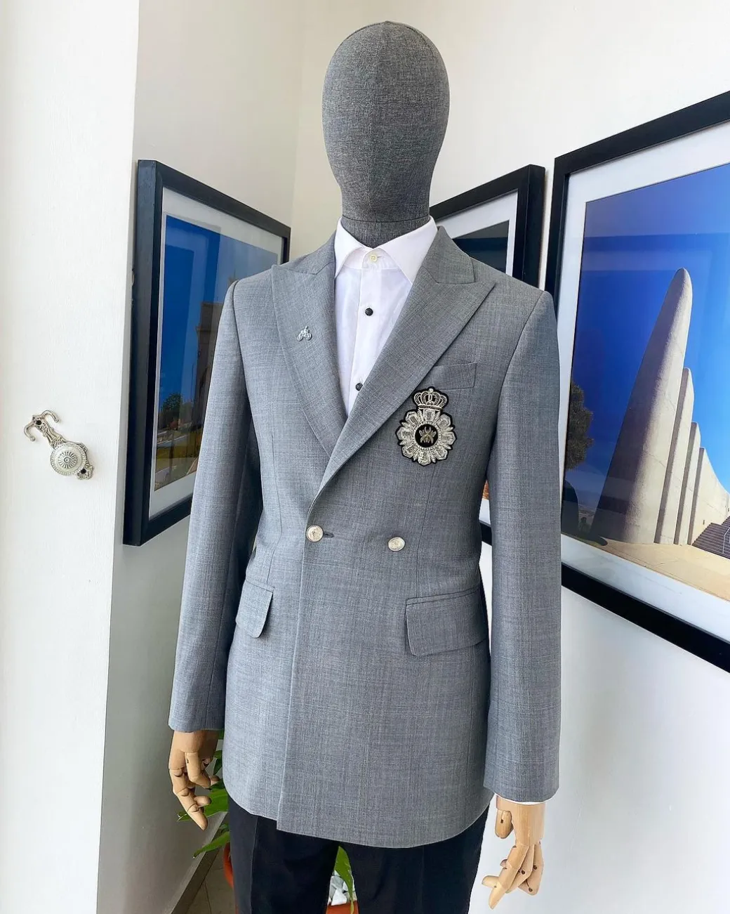 A Cloud Grey Peak Lapel, One button Double Breasted Suit.