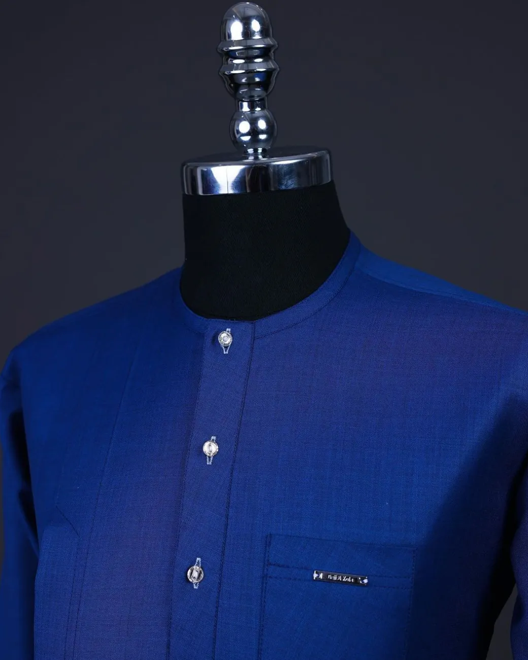 A Cobalt blue, front flap with clear view Swarovski details .