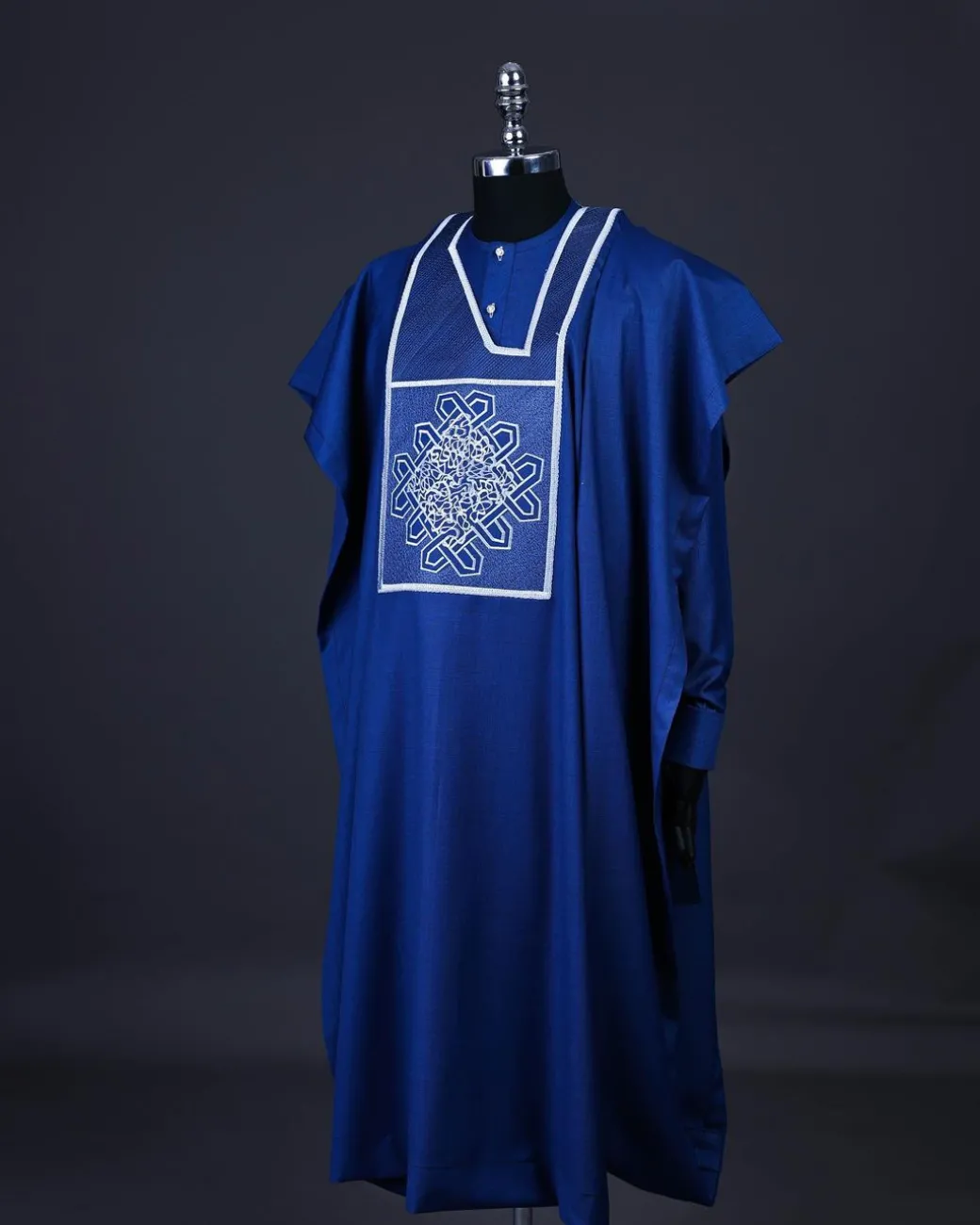 A Cobalt blue, layered dodecagon embroidery Agbada