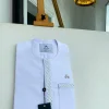 A Cocaine White, Flap with Embroidery Details African Traditional Senator Kaftan Native.